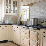 subway tile, white cabinets, aga