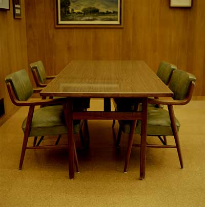 https://thedecorologist.com/wp-content/uploads/2010/04/wood-paneled-boardroom-via-howstuffworks.jpg