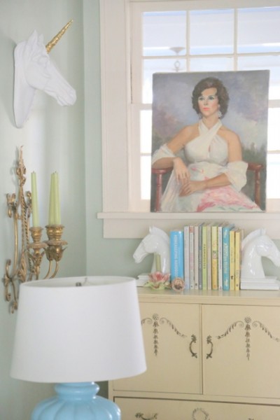 vintage portraits in designer living room