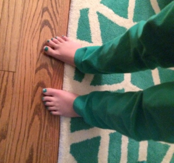 green toenails and rug