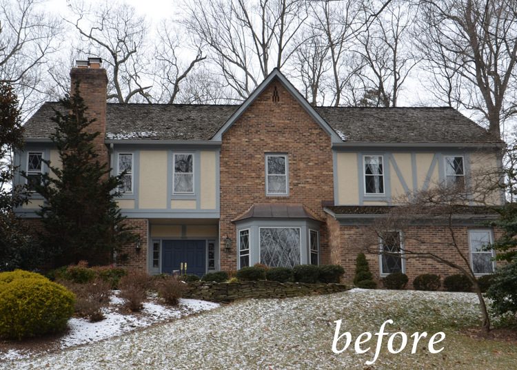 painting the exterior of a tudor house