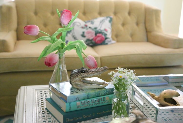 yellow tufted sofa