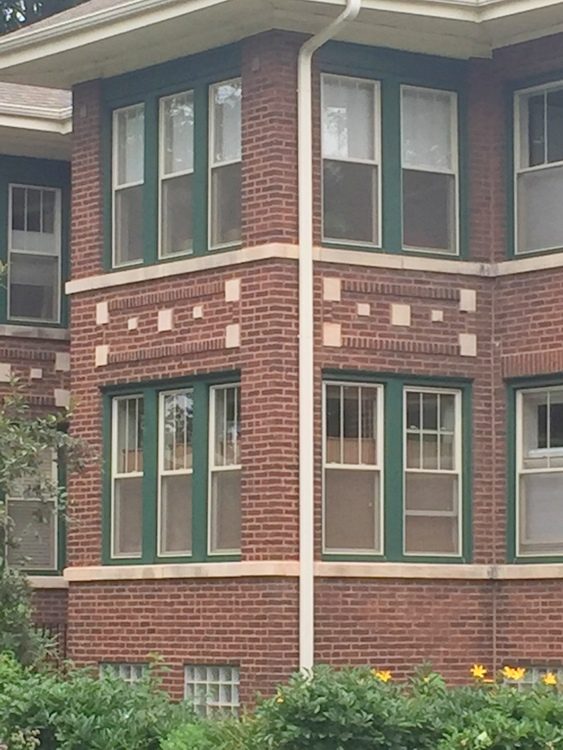 red brick with green trim