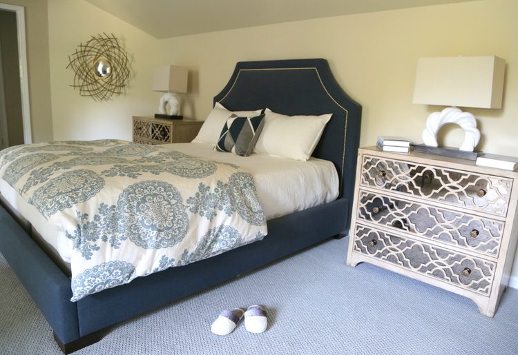 blue upholstered bed