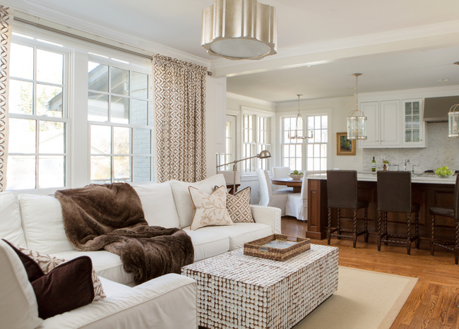 white designer family room and kitchen