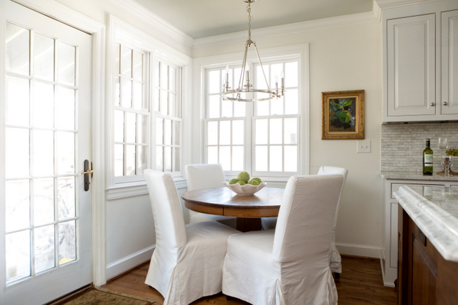 white slipcovered dining chairs