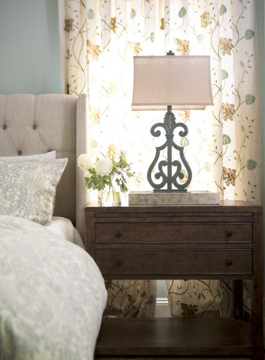 upholstered bed and side table