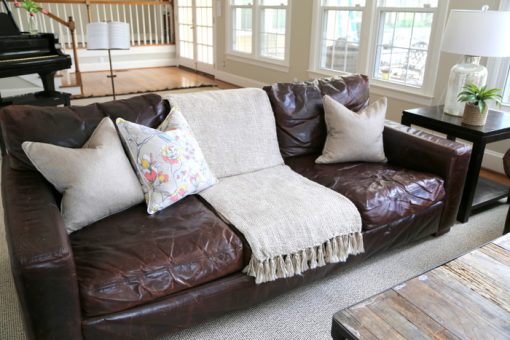 leather sofa with spring cushions