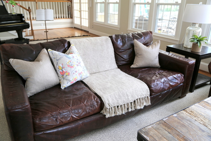 decorating around dark brown leather sofa