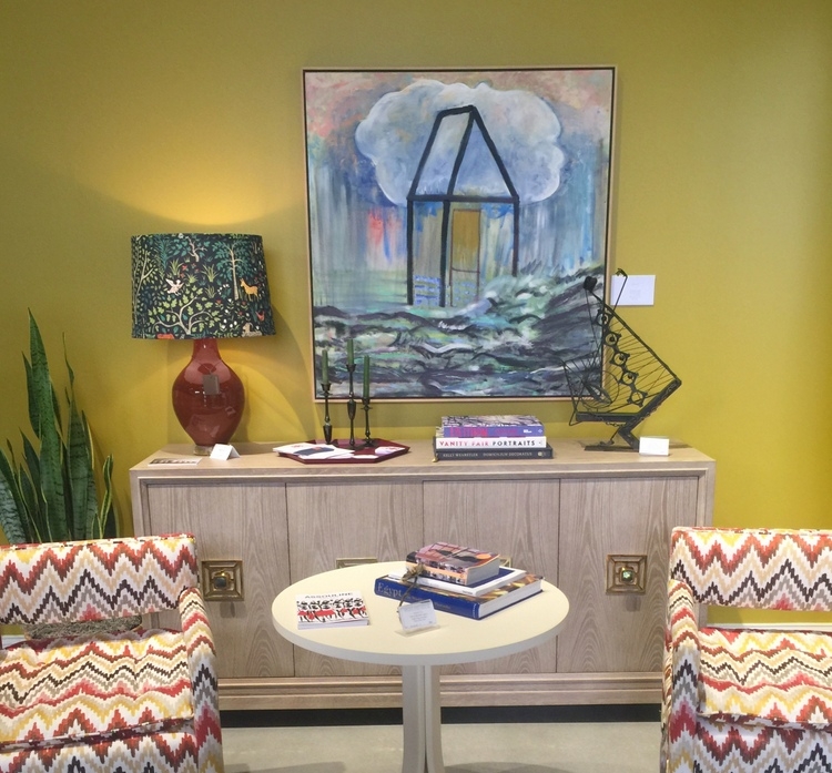 mustard yellow walls at highland house showroom at high point market