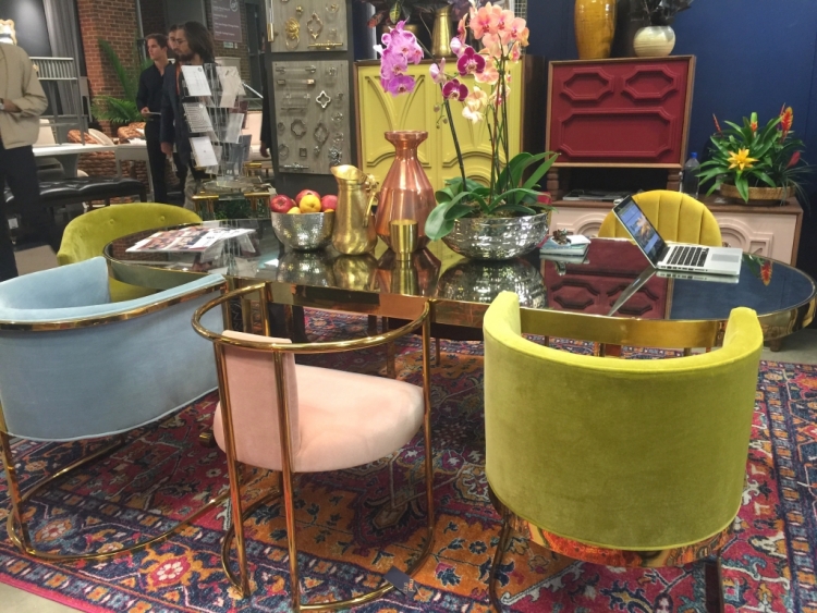 colorful mixed dining chairs with gold accents at ModShop showroom at 2018 High Point Furniture Market