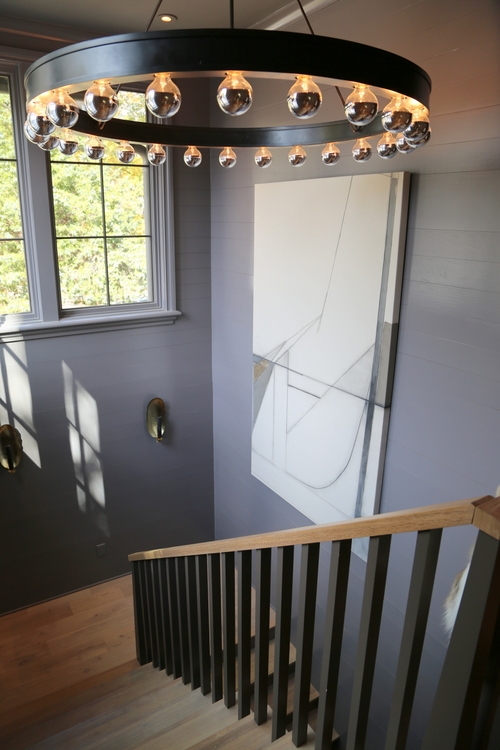 dark gray stairwell shiplap in omore designer showhouse