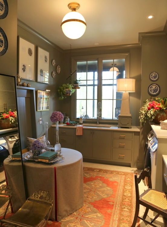 gray green laundry utility room with vintage rug by corey morris for omore designer showhouse