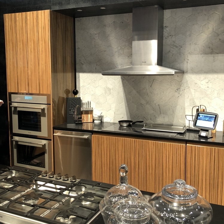 tiger wood kitchen cabinets from Thermador booth at 2018 KBIS