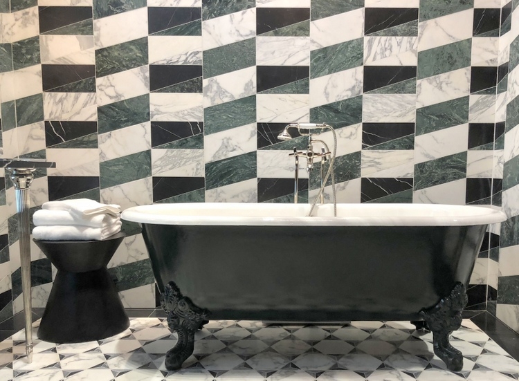 green bathroom with kelly wearstler ann sacks tile and green clawfoot tub at 2018 KBIS