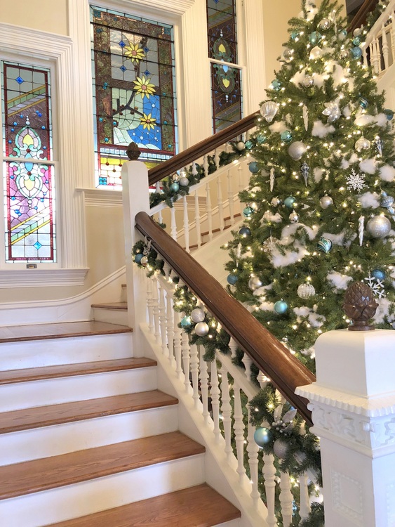 stained glass windows in staircase of historic home