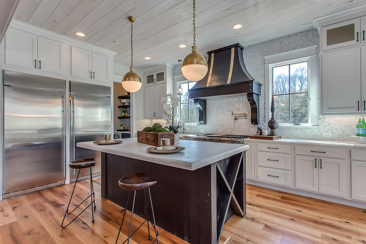 white kitchen with black and gold accents