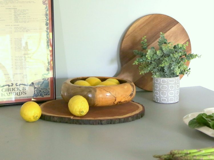 wooden bowls and cutting boards in kitchen photo styling