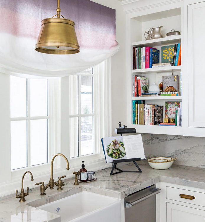 cookbooks in white kitchen photo styling