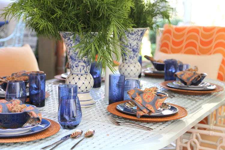 orange and blue outdoor tablesetting