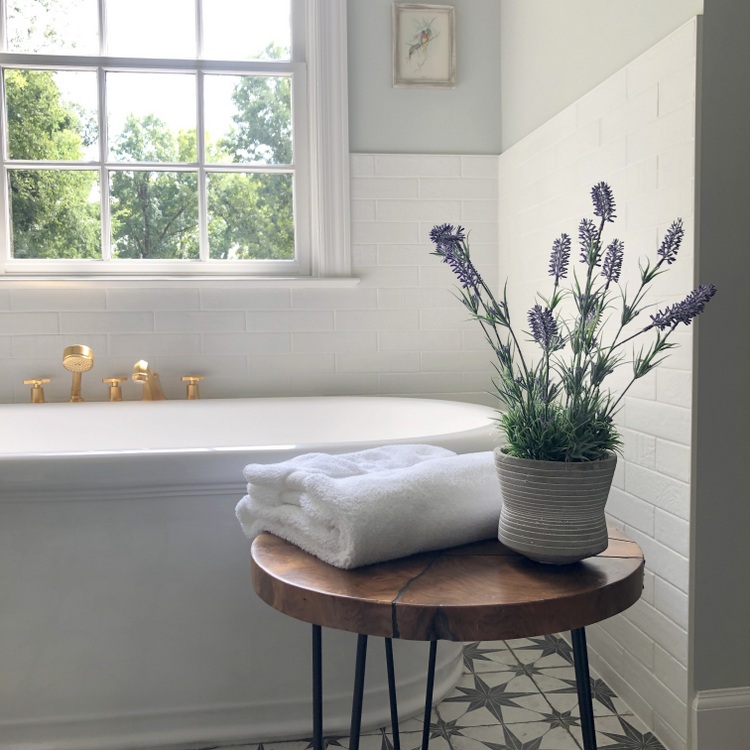 bathtub with gold fixtures