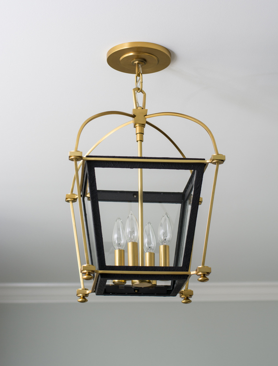 iron and gold light fixture