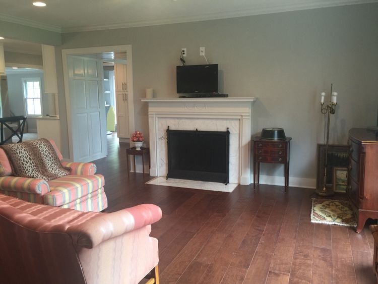 green living room with fireplace