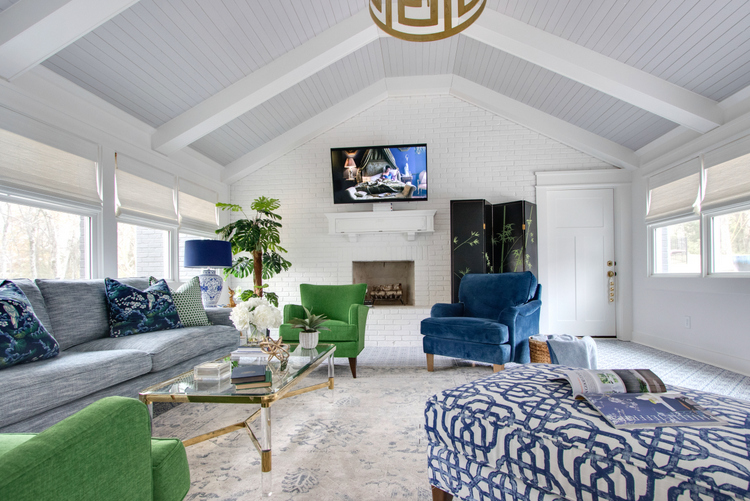 white painted brick in blue and green living room design