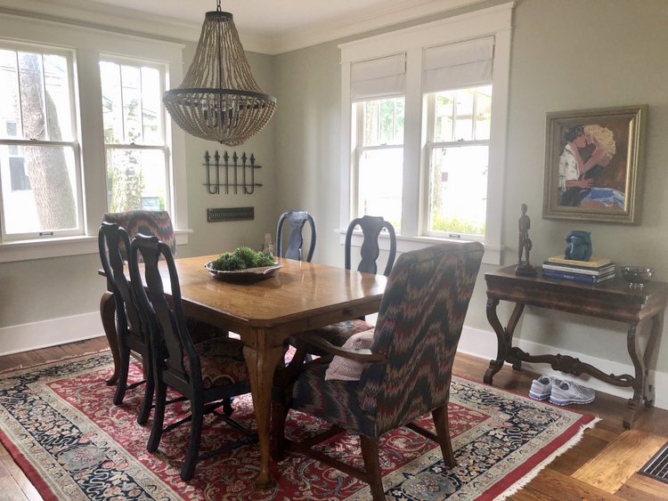 mixing old and new in a gray green dining room