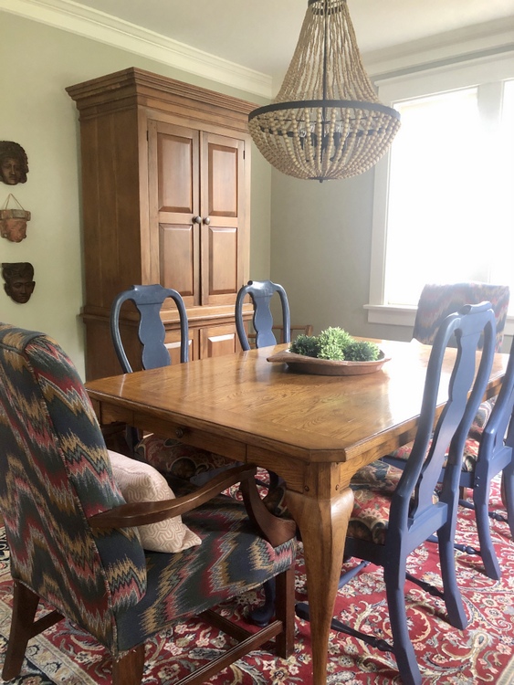 dining room with blue chairs