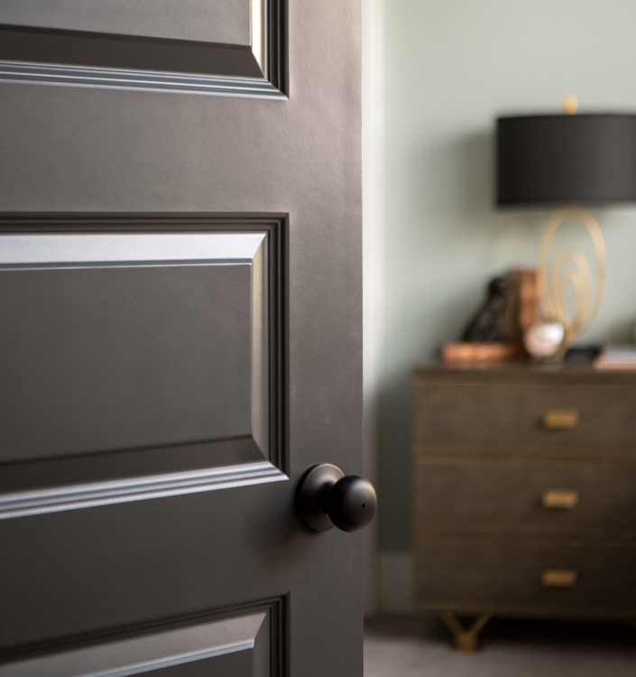 black door into bedroom