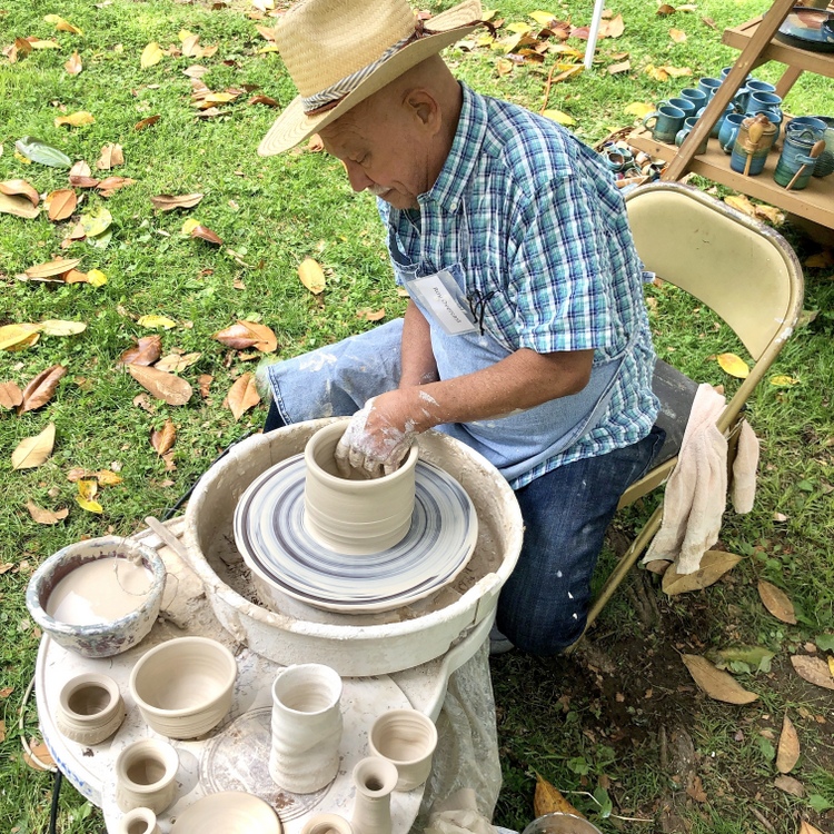 potter and pottery wheel