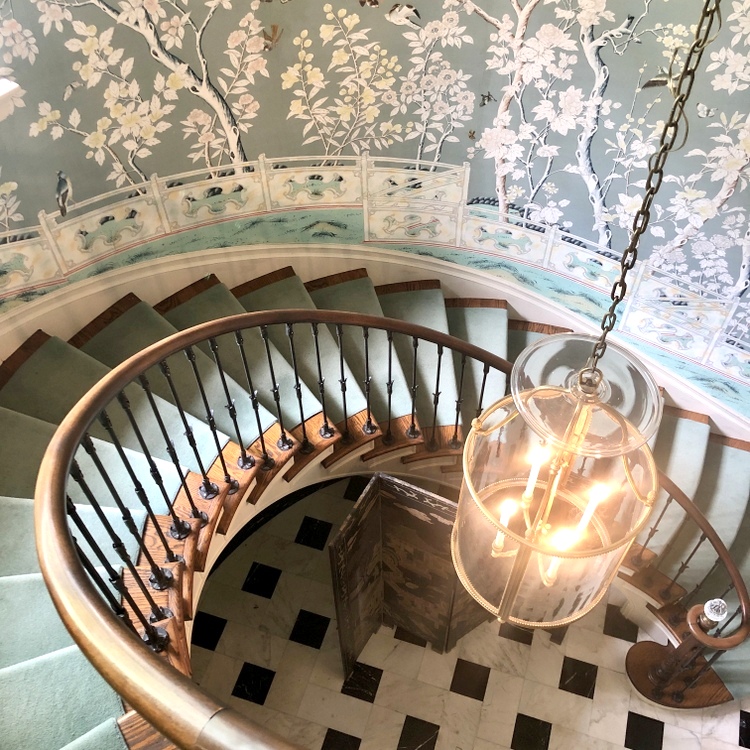 rounded staircase in grand home