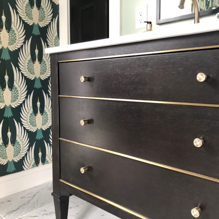 art deco wallpaper in green bathroom